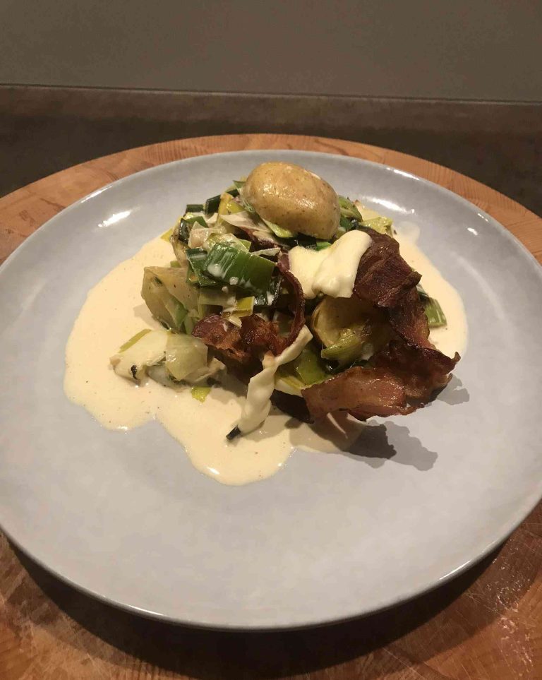 Prei en bacon in room uit de oven